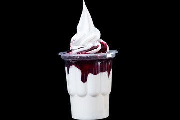 ice cream in cups with fruit syrup isolated