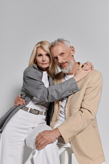 Charming moments of a stylish senior couple celebrating love and togetherness in fashion