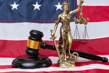 american flag with goddess of justice themis