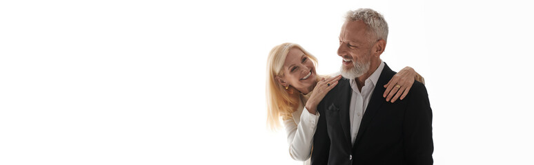 Captivating moments of love between a stylish elderly couple in chic attire