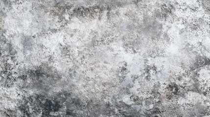 Obraz premium A textured, mottled surface of varying shades of gray