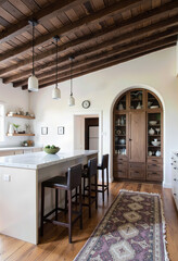 rustic kitchen, modern luxury, vaulted ceiling, wood beams, arched hutch, marble island, elegant, timeless, interior design, home decor, farmhouse style, warm, inviting, custom cabinetry, spacious, na