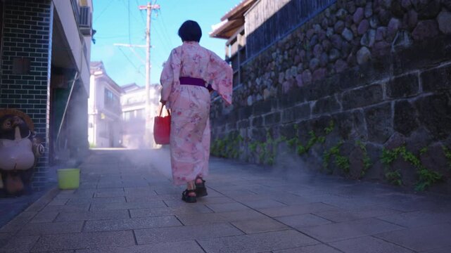 Japanese Women in Yukata Walking Through Geothermal Street, Beppu