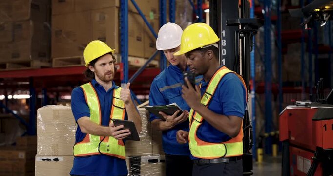 warehouse teamwork including african american worker and caucasian staff analyzing cargo management data near forklift using tablet during logistic operation in modern stock distribution environment - Powered by Adobe