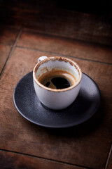 Cup of coffee on rustic wooden background. Soft focus. Copy space	