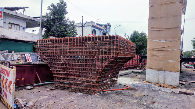 Large cage of steel reinforcement bars called rebar, used in construction work of metro pillars eraction creating reinforced concrete structures. 
