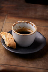 Cup of coffee on wooden background. Soft focus. Copy space	
