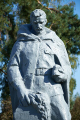statue of soviet soldier on cemetery
