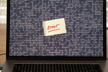 Computer error, note on the screen of a laptop. Warning, defect, malfunction, error,  interruption,...