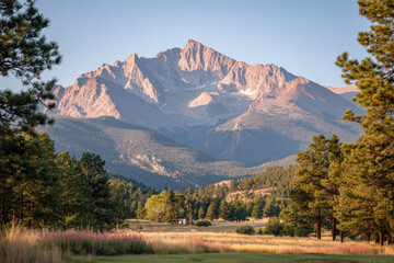 experience breathtaking beauty of colorado rocky mountains at sunset where sky is awash with ultrabright hues of