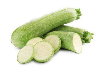 Fresh whole and cut zucchinis isolated on white
