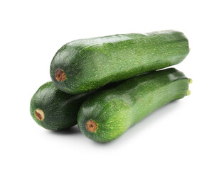 Three fresh ripe zucchinis isolated on white