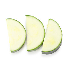 Pieces of fresh zucchini isolated on white, top view