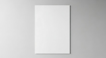 Vertical poster mockup with a minimalist design on a plain gray wall background.