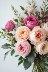 A beautiful bouquet of pastel roses in various shades, perfect for any floral arrangement or gift.