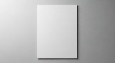 Clean minimalist presentation shows a blank white poster mockup on gray wall.