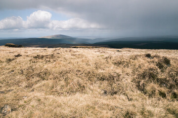 Heavy rain approaches Knocklayd Mountain in the Antrim Hills in County Antrim, Northern Ireland 