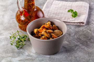 Peeled mussels heap in the bowl