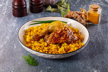 Roasted chicken leg with yellow rice