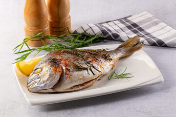Baked dorada fish with spices