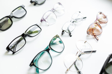 Set with different eyeglasses with lenses isolated on white