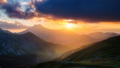 sunset in the mountains with cloudy background