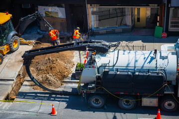 Installation of underground electric cable in the city to the restaurant