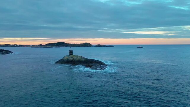 Drone footage captures the Atlantic Ocean Road Atlanterhavsveien winding through coastal islands and islets in Norway.