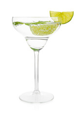Martini cocktail with slices of lime and mint on white background
