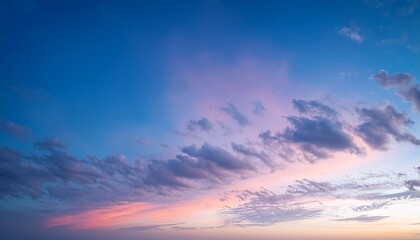 dreamy pastel sky and cloudscape scene at dawn or dusk creates a tranquil and calming aesthetic ideal for design projects needing a serene backdrop