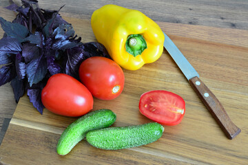 Fresh Vegetables on a Wooden Cutting Board