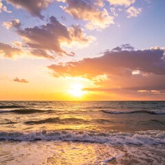 Obraz premium A breathtaking coastal sunset paints the sky in vibrant hues of orange, pink, and purple, as waves gently lap at the shore.