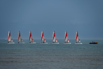 Langrune-Sur-Mer, France - 08 06 2025: View of colorful sailing boats on the sea from a sailing...