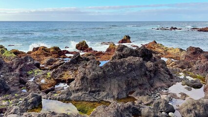 A Beautiful and Scenic Coastal Landscape Featuring a Rocky Shoreline and Tide Pools