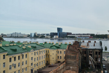 Fototapeta premium An Urban Landscape Showcasing a Picturesque Riverfront Alongside Historical Architecture