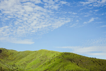 Bukit Premium, East Java, Indonesia with Erupting Mount Semeru