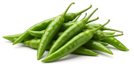Fototapeta premium Fresh green chili peppers piled high on a white surface ready for cooking use