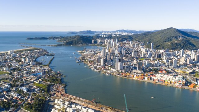 Aerial panoramic view of Itaja&iacute; and Navegantes with the Itaja&iacute;-A&ccedil;u River channel leading to the port.