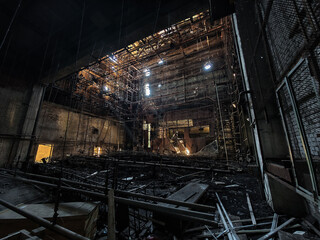 inside a building burned down and destroyed during the war in a city in Ukraine