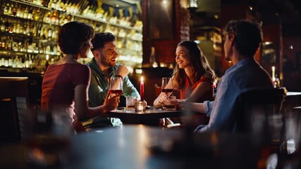 Two couples date night in luxury bar. Group happy friends enjoying hangout - Powered by Adobe