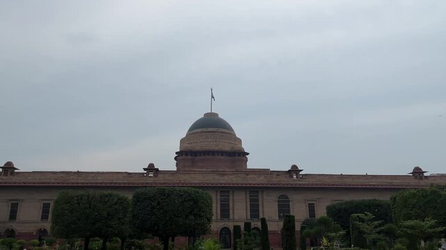 A Beautiful shot of Rashtrapati Bhavan, president house in front on of a bigger garden in New Delhi, India