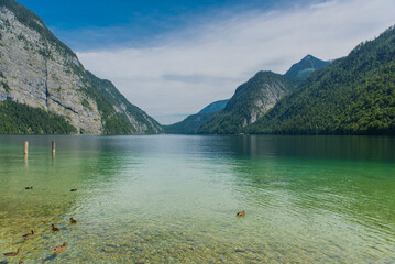 Beautiful Königssee lake in Bavaria, Germany – turquoise alpine water surrounded by majestic...