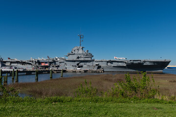 Charleston, South Carolina, USA - March 29, 2024. The historic USS Yorktown aircraft carrier is docked at Patriots Point Naval & Maritime Museum in Charleston Harbor.