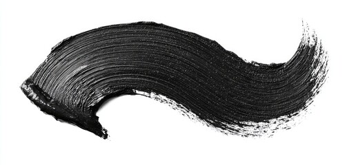 Swath of black creamy substance, like paint, on white backdrop