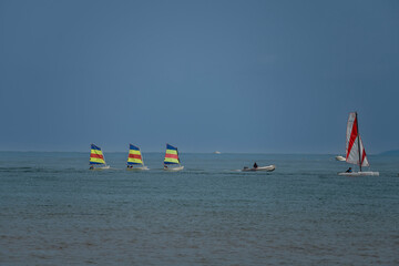 Langrune-Sur-Mer, France - 08 06 2025: View of colorful sailing boats on the sea from a sailing...