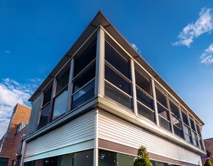 prime commercial property with available space for purchase or rent in a versatile mixed use storefront and office building featuring an awning