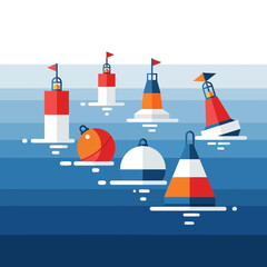 Collection of nautical buoys floating on blue water surface.