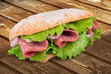 Tasty fresh big sandwich with ham, and vegetables