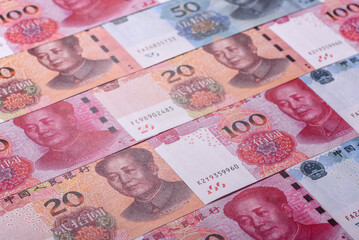 Cash, paper yuan banknotes for business transactions, financial background. Yuan banknotes
