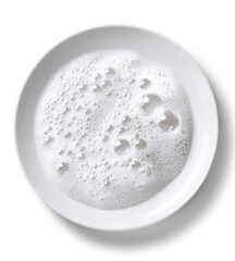 White dish with a thick layer of suds
